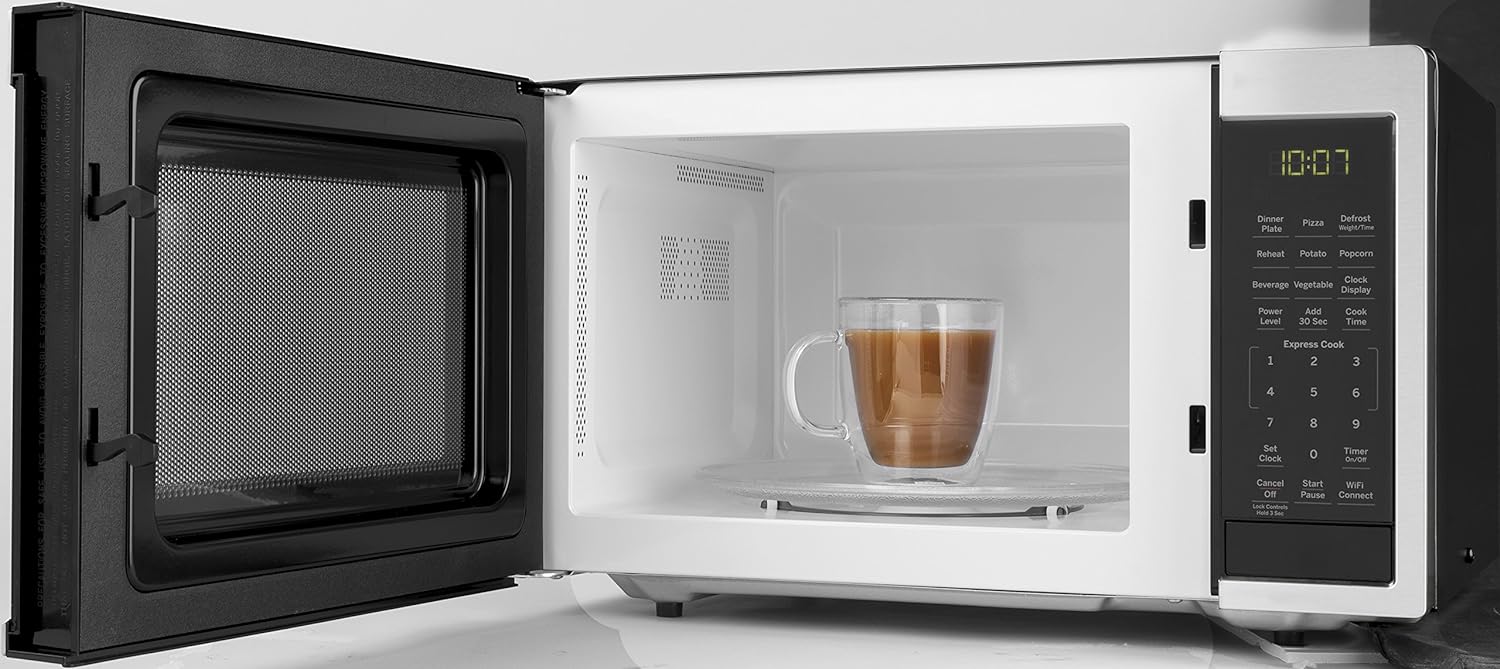 A microwave with coffee