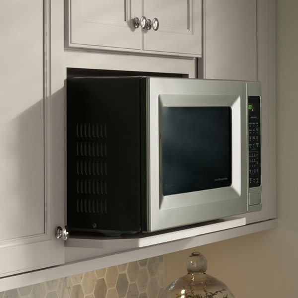 a microwave on an interior wall